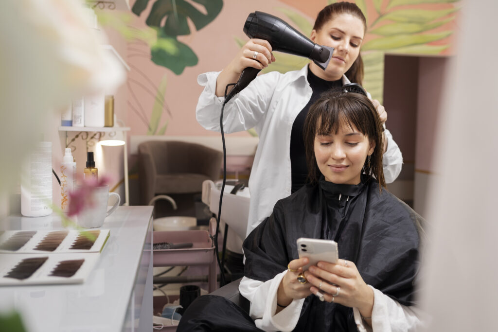 woman-getting-treatment-hairdresser-shop